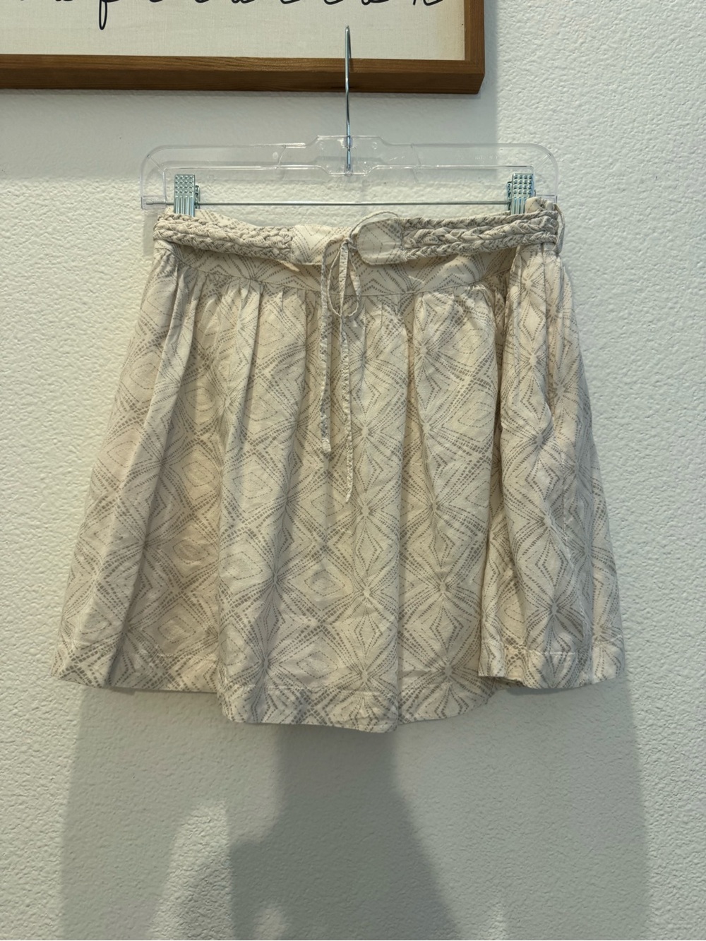 Club Monaco Ripley Skirt, an off-white/cream mini skirt featuring a braided tie